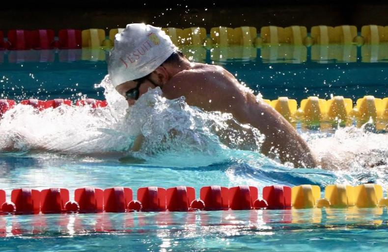 Adamson taking a breath during breaststroke