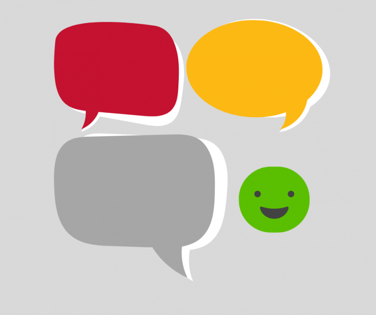 Graphics of text bubbles in various colors with a green smiley face 